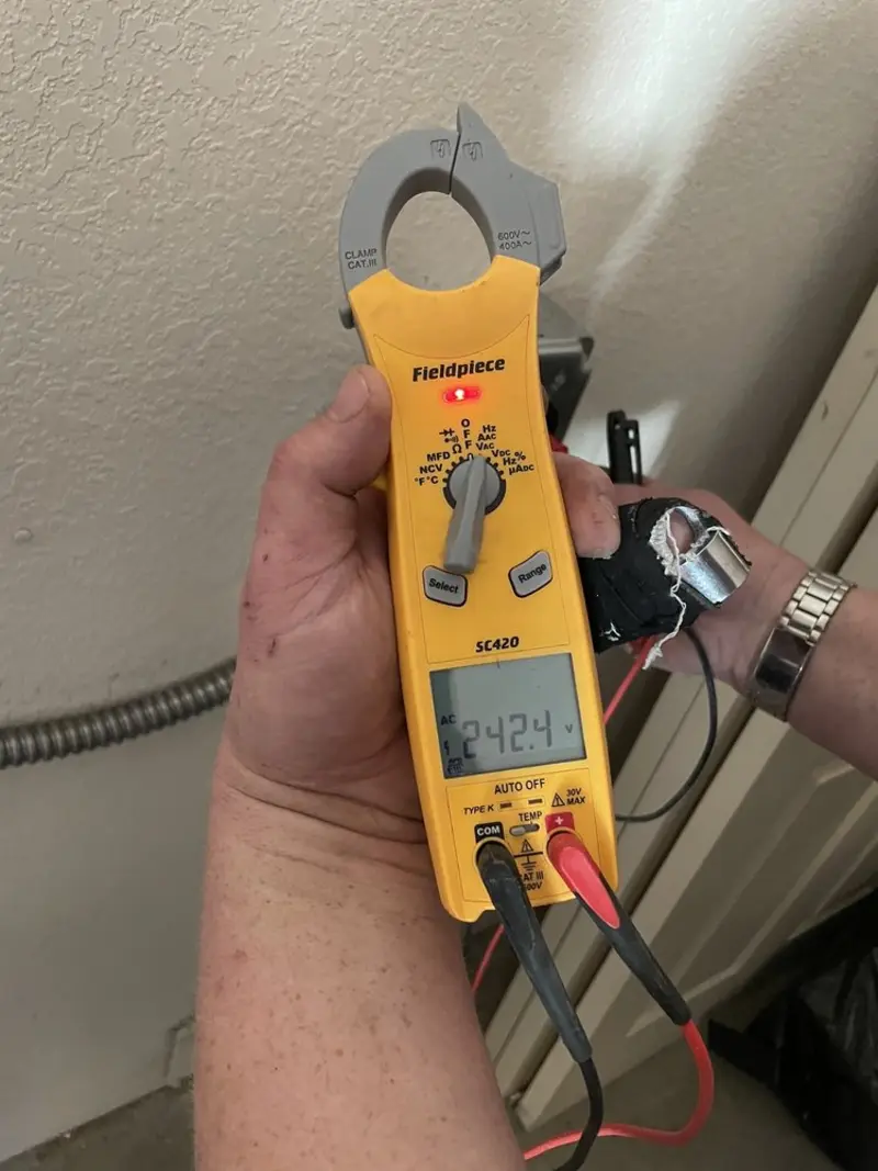 Voltage testing with clamp meter during Aluminum Wiring Replacement in Bainbridge